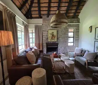 Mtwazi Lodge Luxury 8 Bed veranda and gardens in Hluhluwe Game Reserve